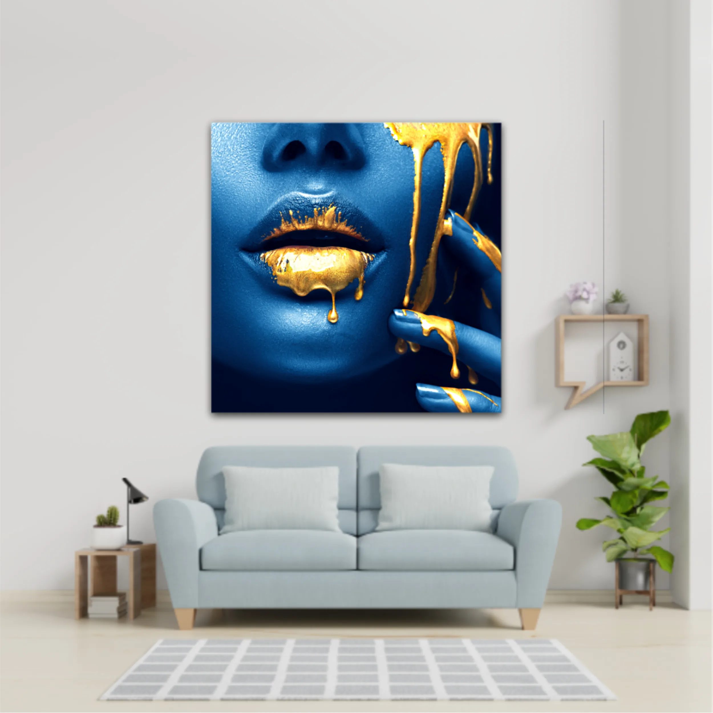 Lipgloss dripping from sexy lips, golden liquid drops on beautiful model girl mouth, gold metallic skin make-up. Beauty woman makeup close up