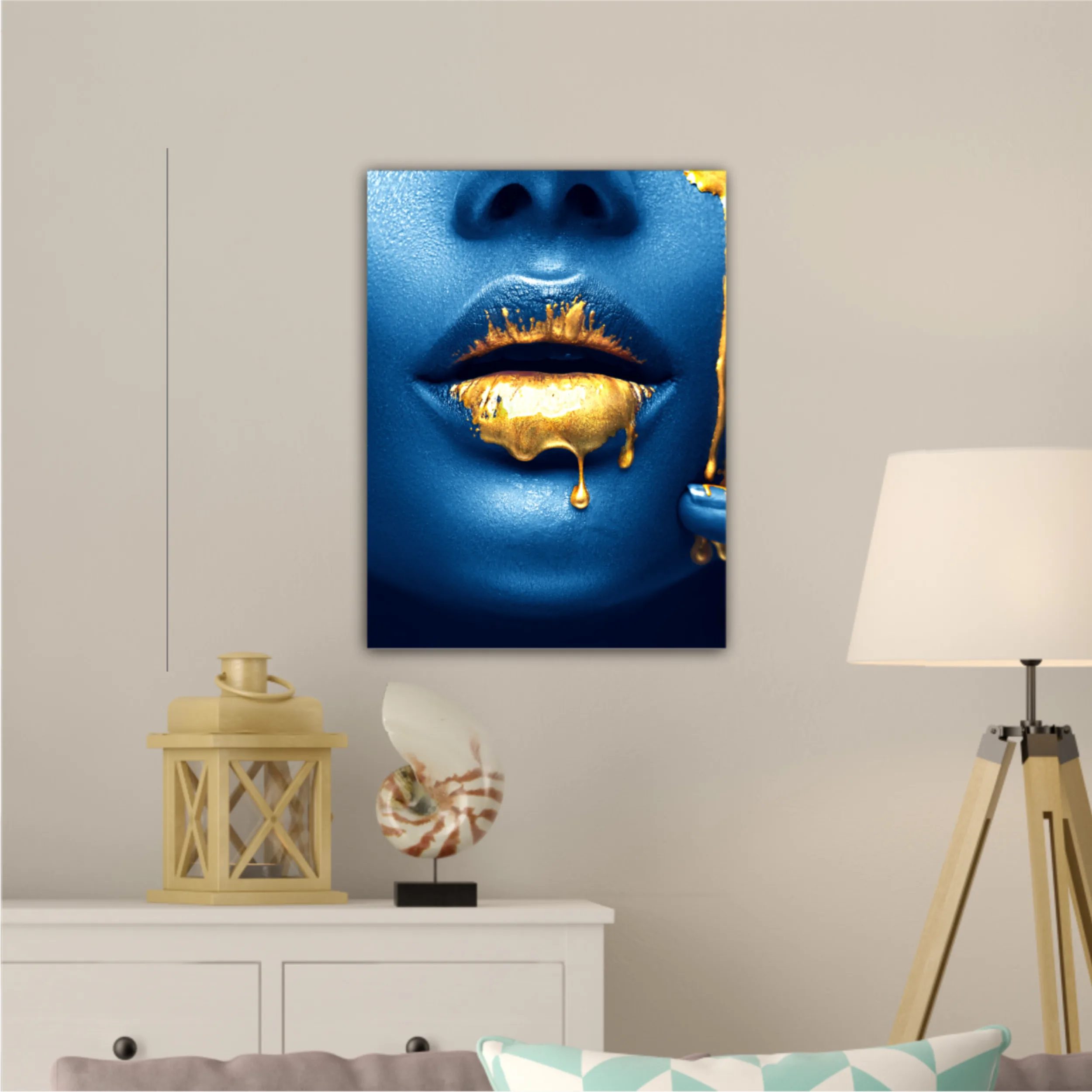 Lipgloss dripping from sexy lips, golden liquid drops on beautiful model girl mouth, gold metallic skin make-up. Beauty woman makeup close up