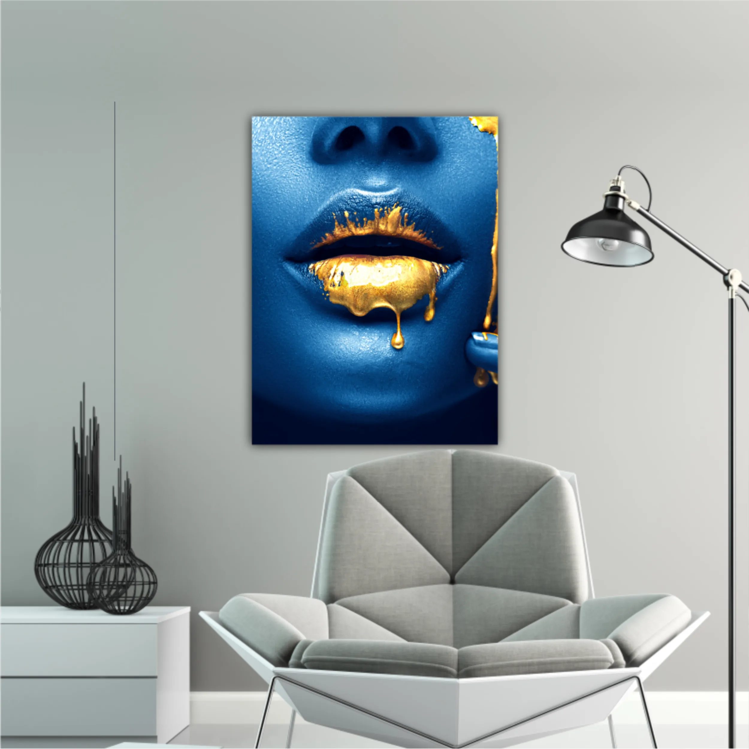 Lipgloss dripping from sexy lips, golden liquid drops on beautiful model girl mouth, gold metallic skin make-up. Beauty woman makeup close up