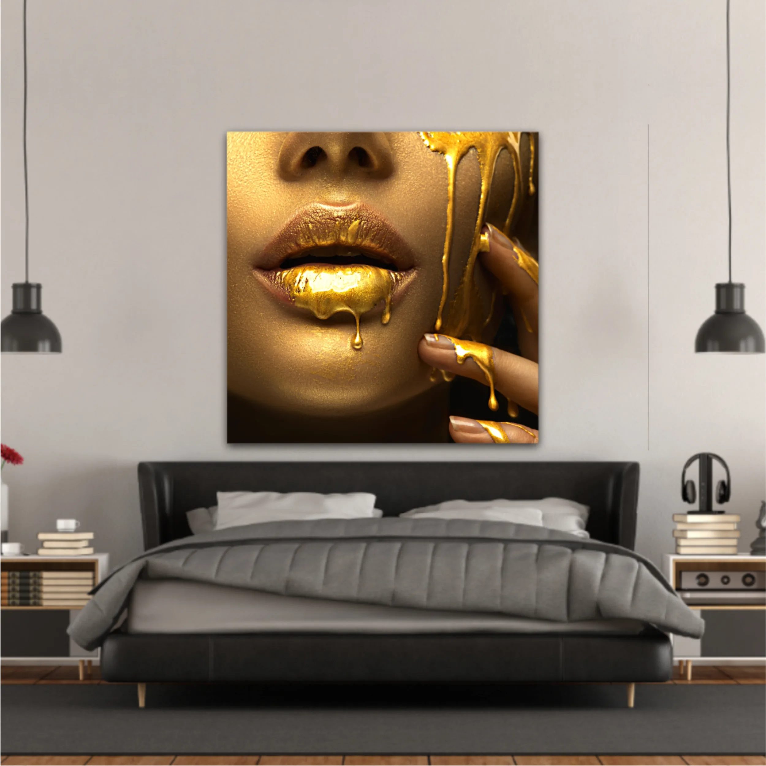 Lipgloss dripping from sexy lips, golden liquid drops on beautiful model girls mouth, gold metallic skin make-up. Beauty woman makeup close up