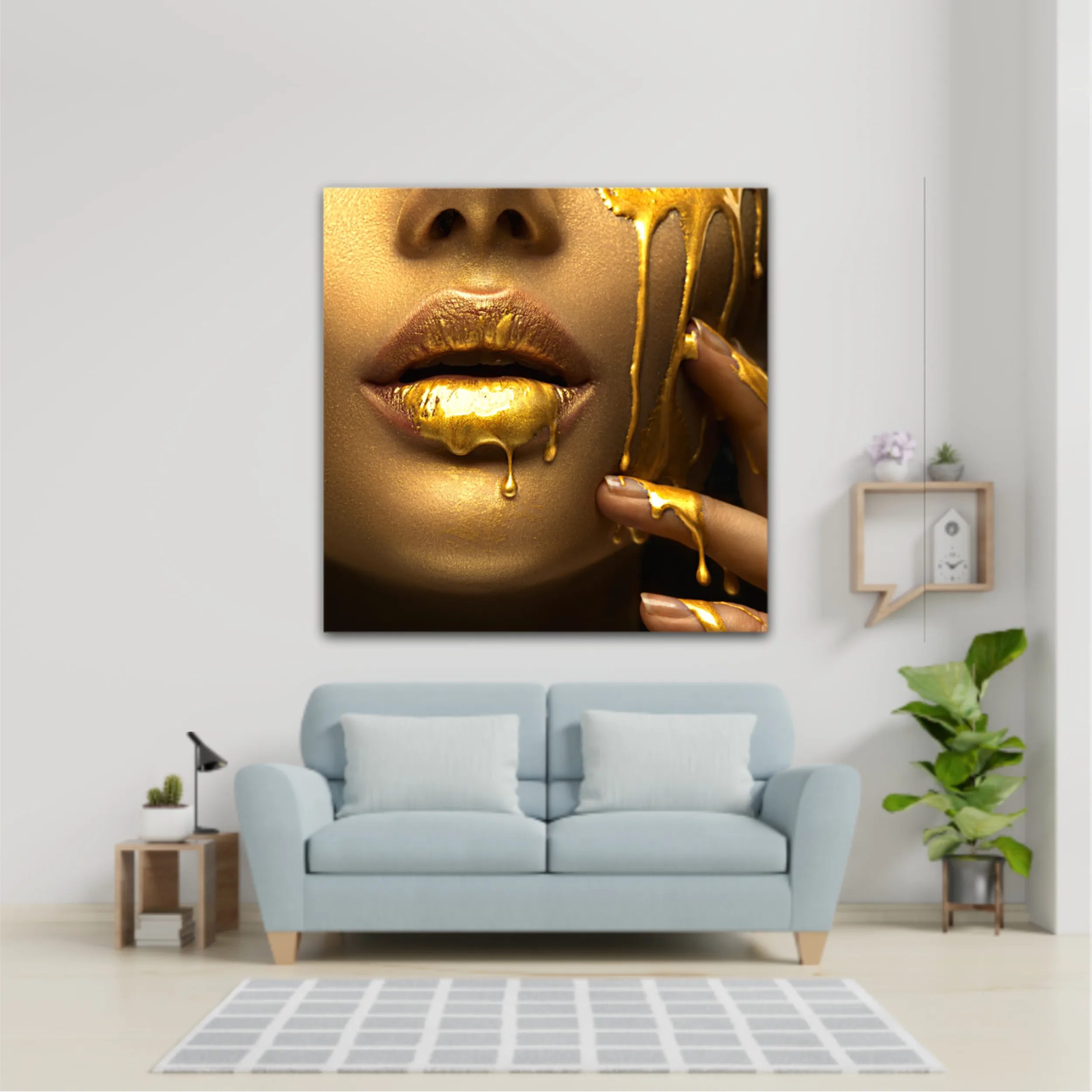 Lipgloss dripping from sexy lips, golden liquid drops on beautiful model girls mouth, gold metallic skin make-up. Beauty woman makeup close up