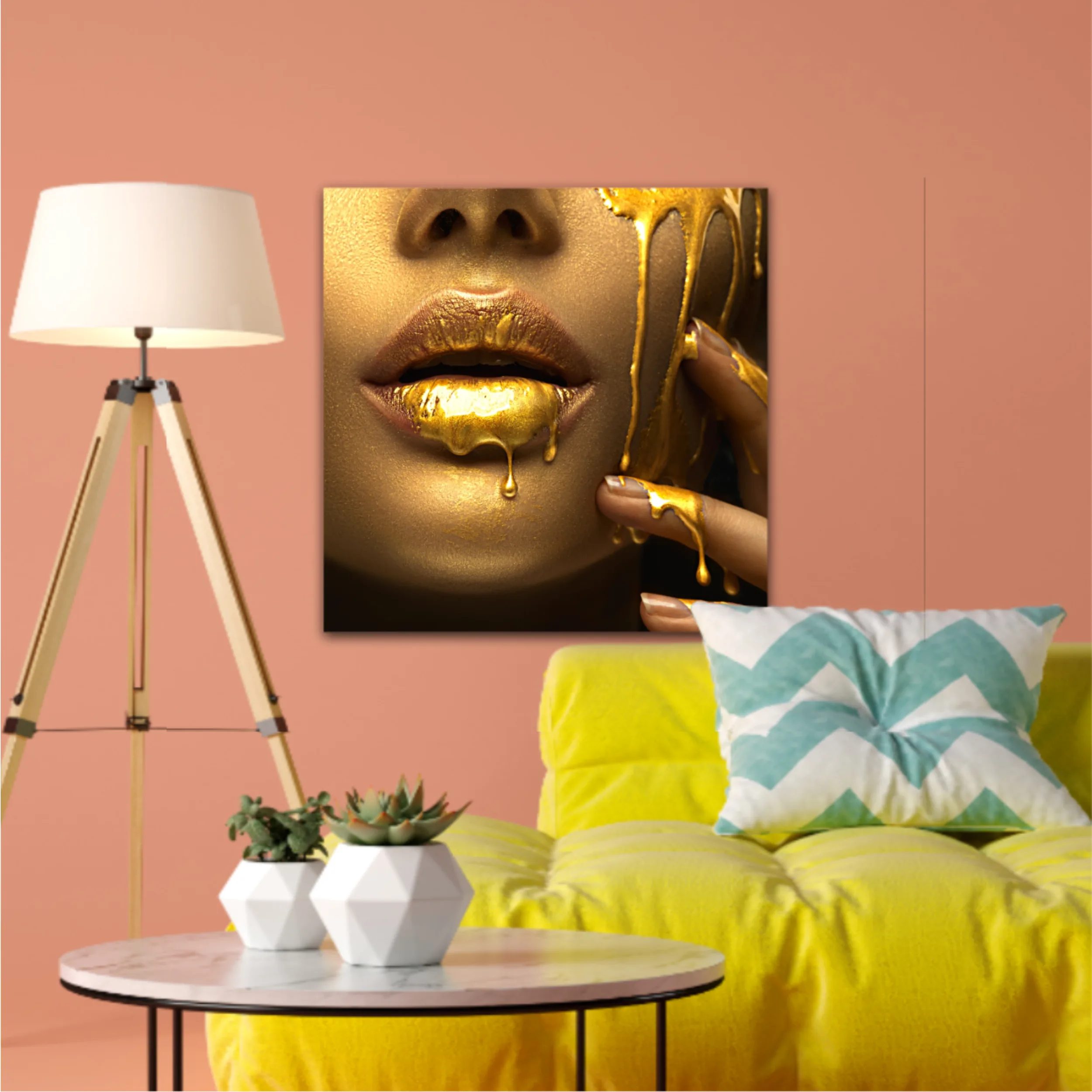 Lipgloss dripping from sexy lips, golden liquid drops on beautiful model girls mouth, gold metallic skin make-up. Beauty woman makeup close up