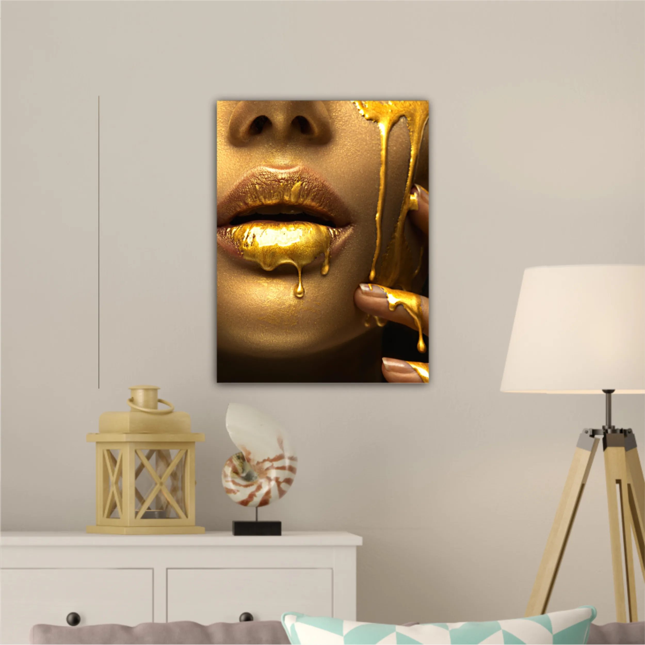 Lipgloss dripping from sexy lips, golden liquid drops on beautiful model girls mouth, gold metallic skin make-up. Beauty woman makeup close up