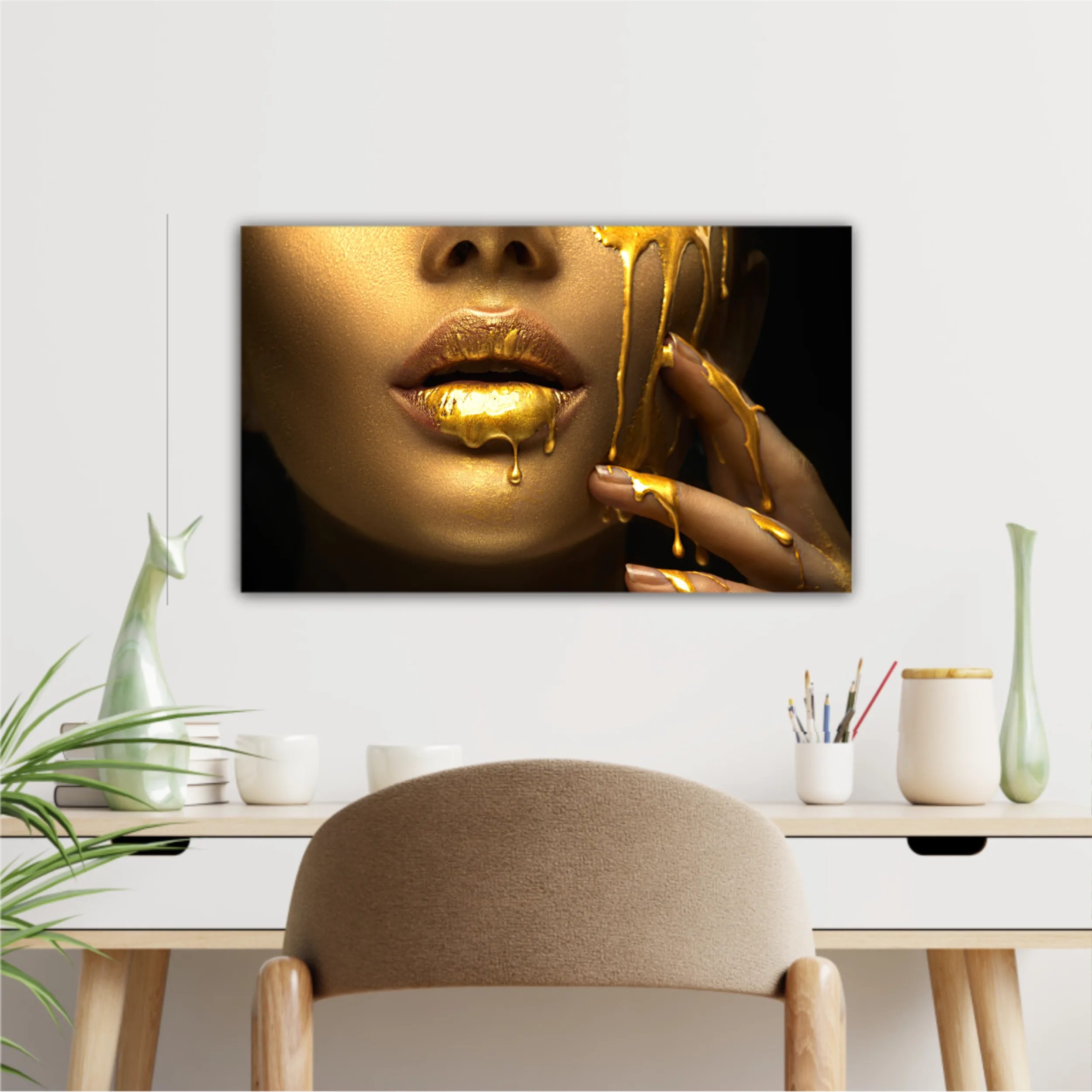 Lipgloss dripping from sexy lips, golden liquid drops on beautiful model girls mouth, gold metallic skin make-up. Beauty woman makeup close up