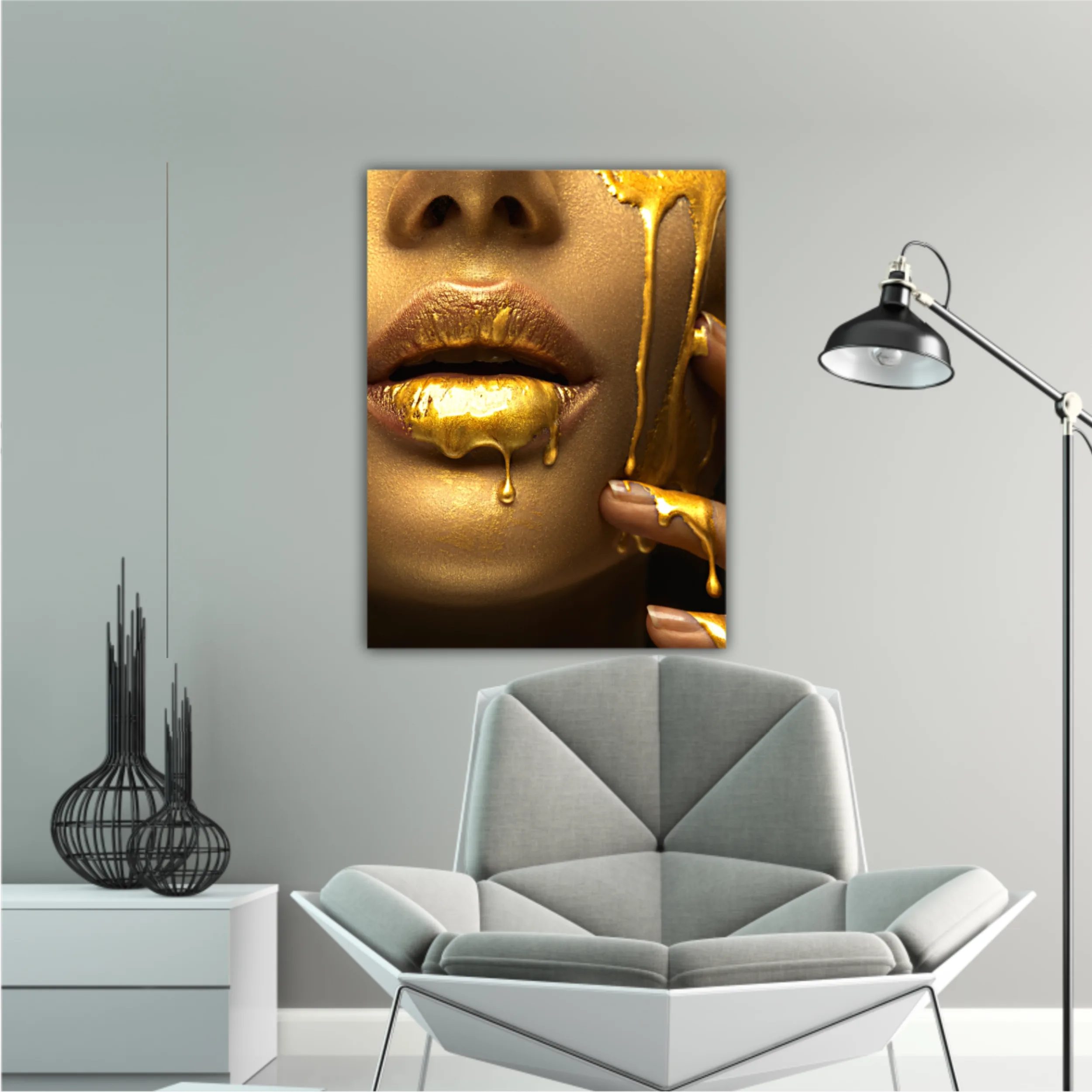 Lipgloss dripping from sexy lips, golden liquid drops on beautiful model girls mouth, gold metallic skin make-up. Beauty woman makeup close up