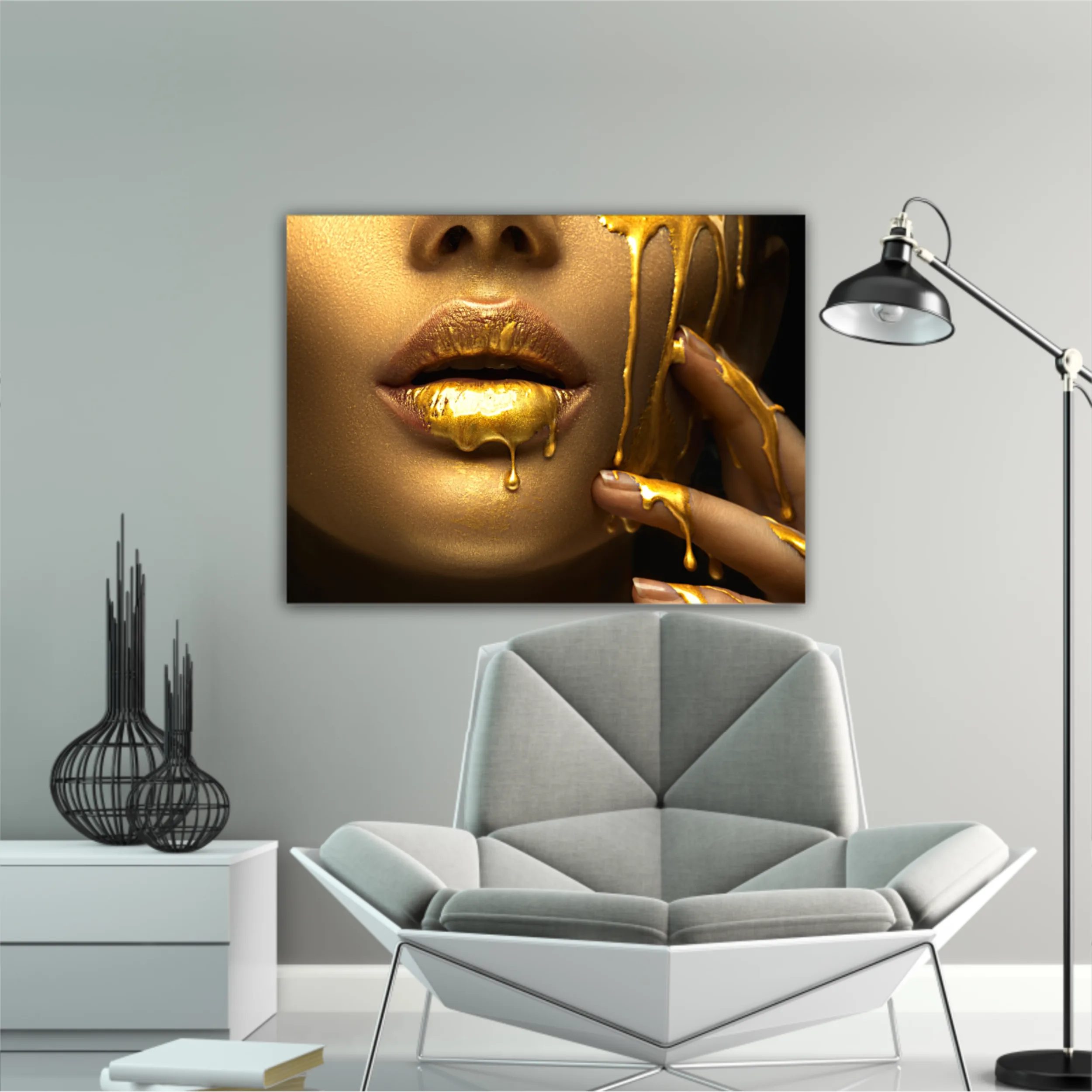 Lipgloss dripping from sexy lips, golden liquid drops on beautiful model girls mouth, gold metallic skin make-up. Beauty woman makeup close up