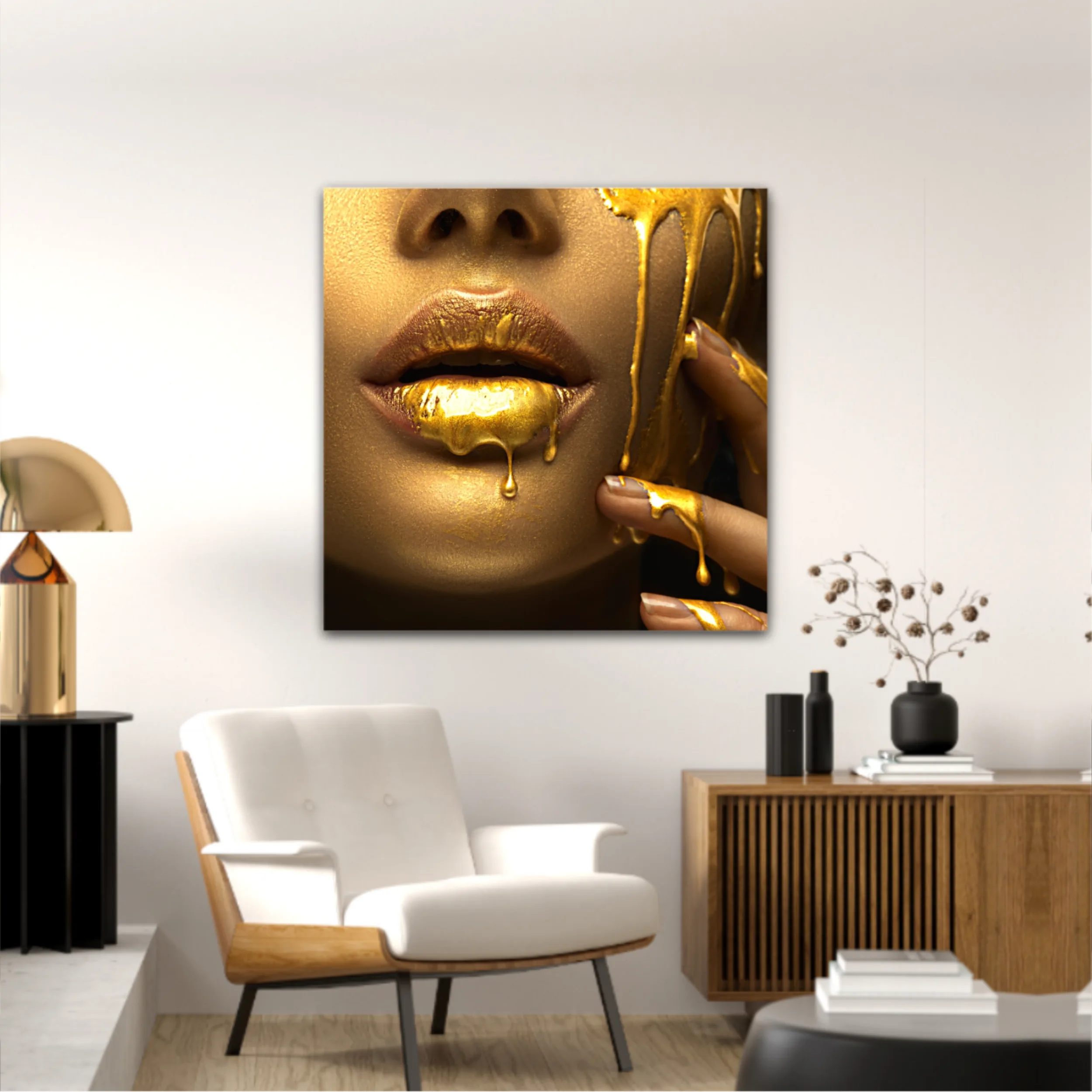 Lipgloss dripping from sexy lips, golden liquid drops on beautiful model girls mouth, gold metallic skin make-up. Beauty woman makeup close up