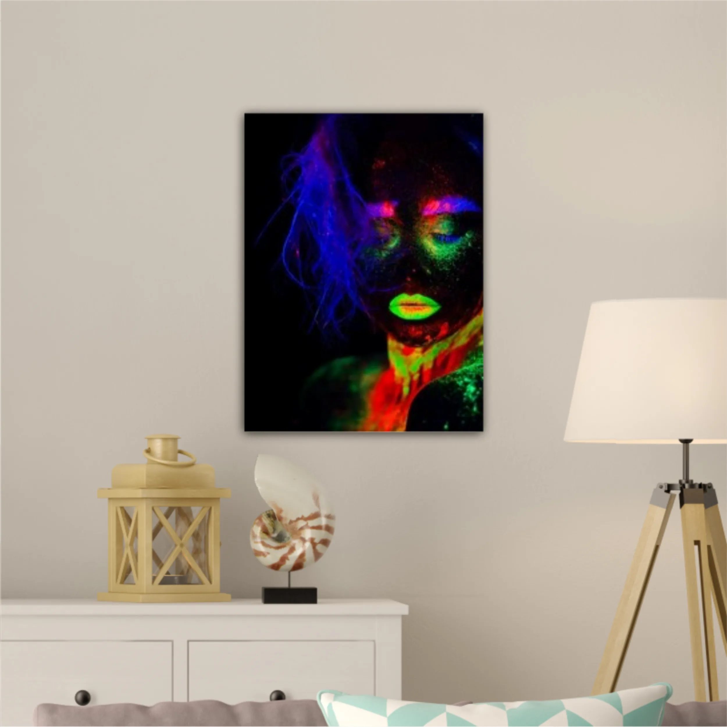 It is portrait of beautiful model with fluorescent make-up, Art design of female posing in UV with colorful make up