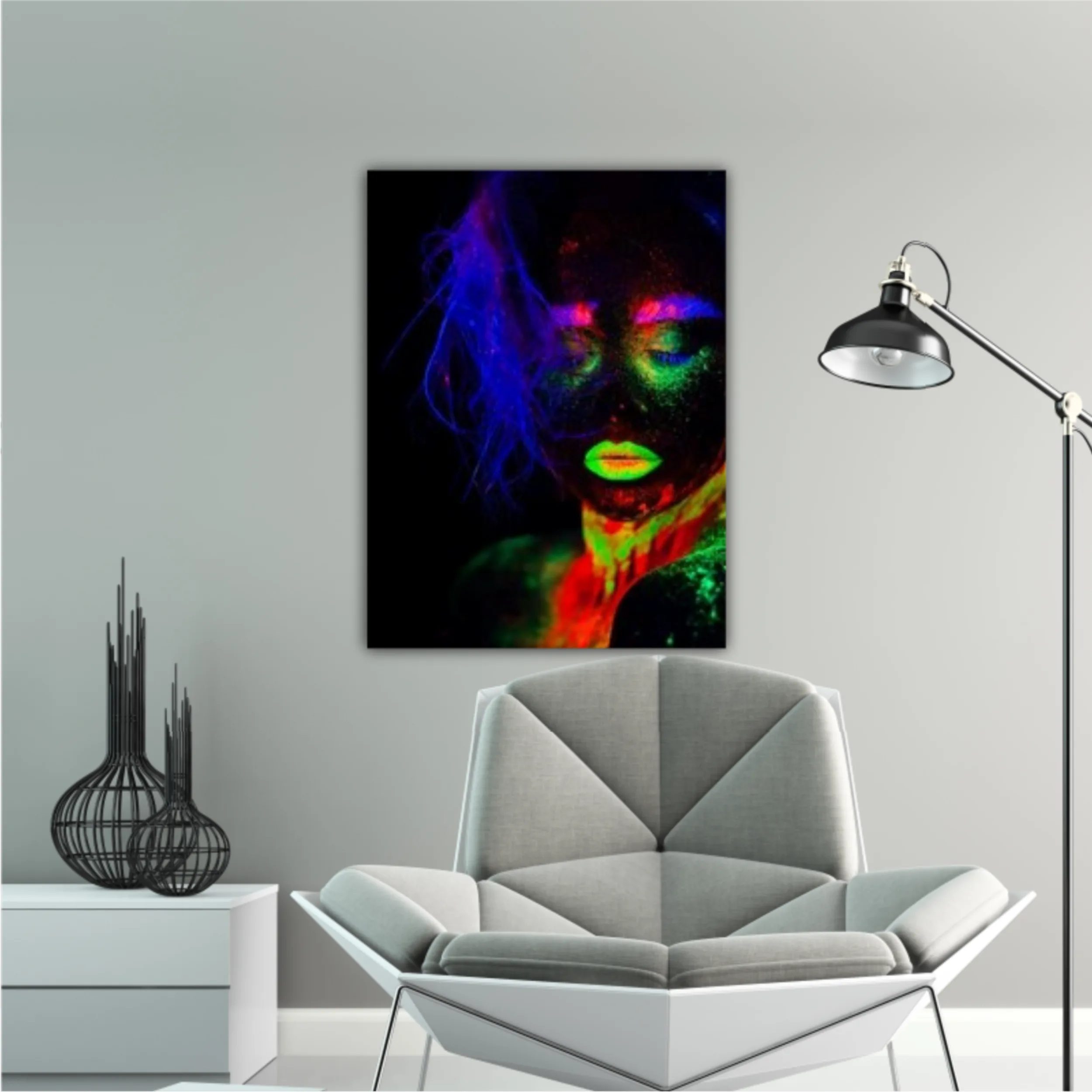 It is portrait of beautiful model with fluorescent make-up, Art design of female posing in UV with colorful make up