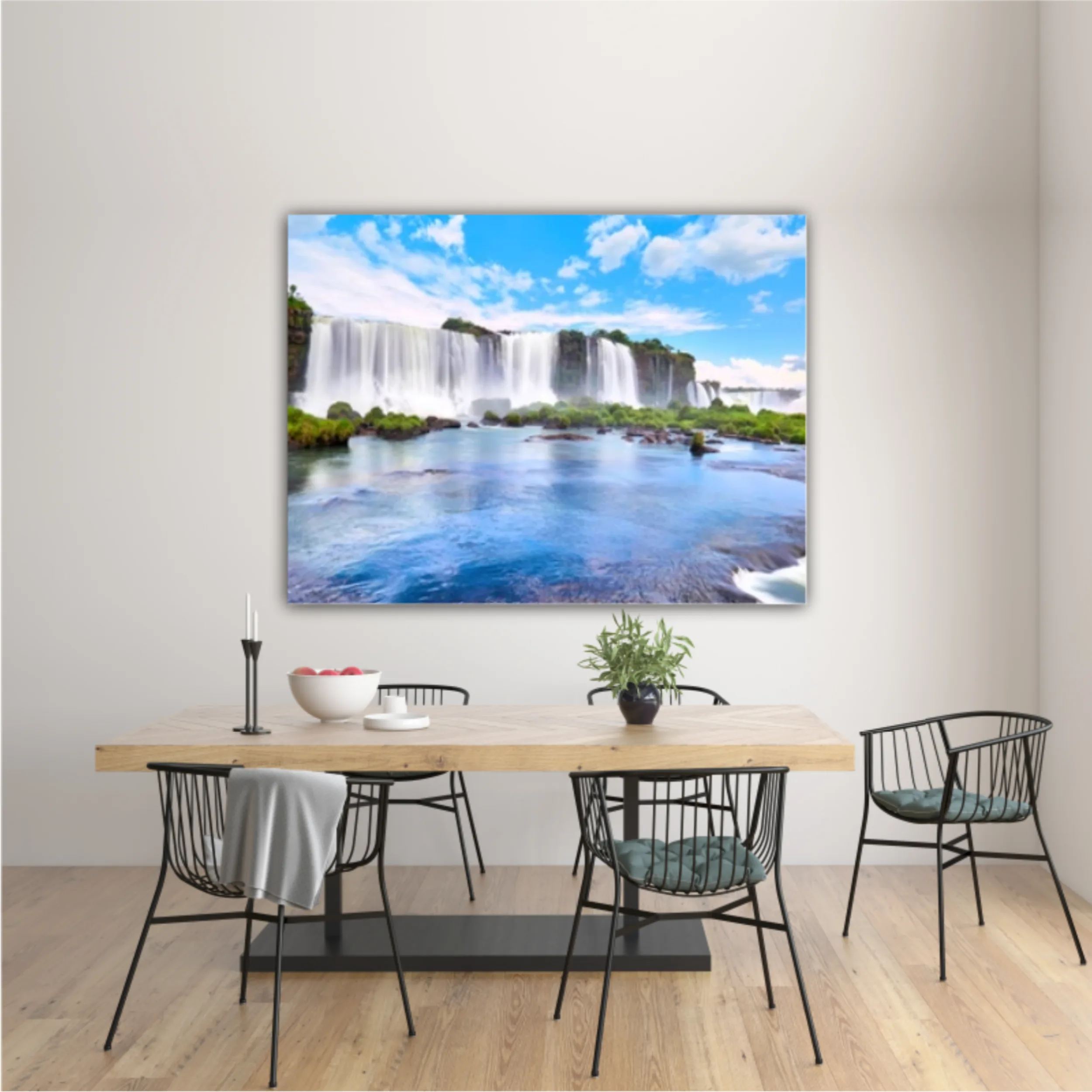 Panoramic view of many majestic powerful water cascades with mist and reflection of blue sky with clouds. Panoramic image of Iguazu valley