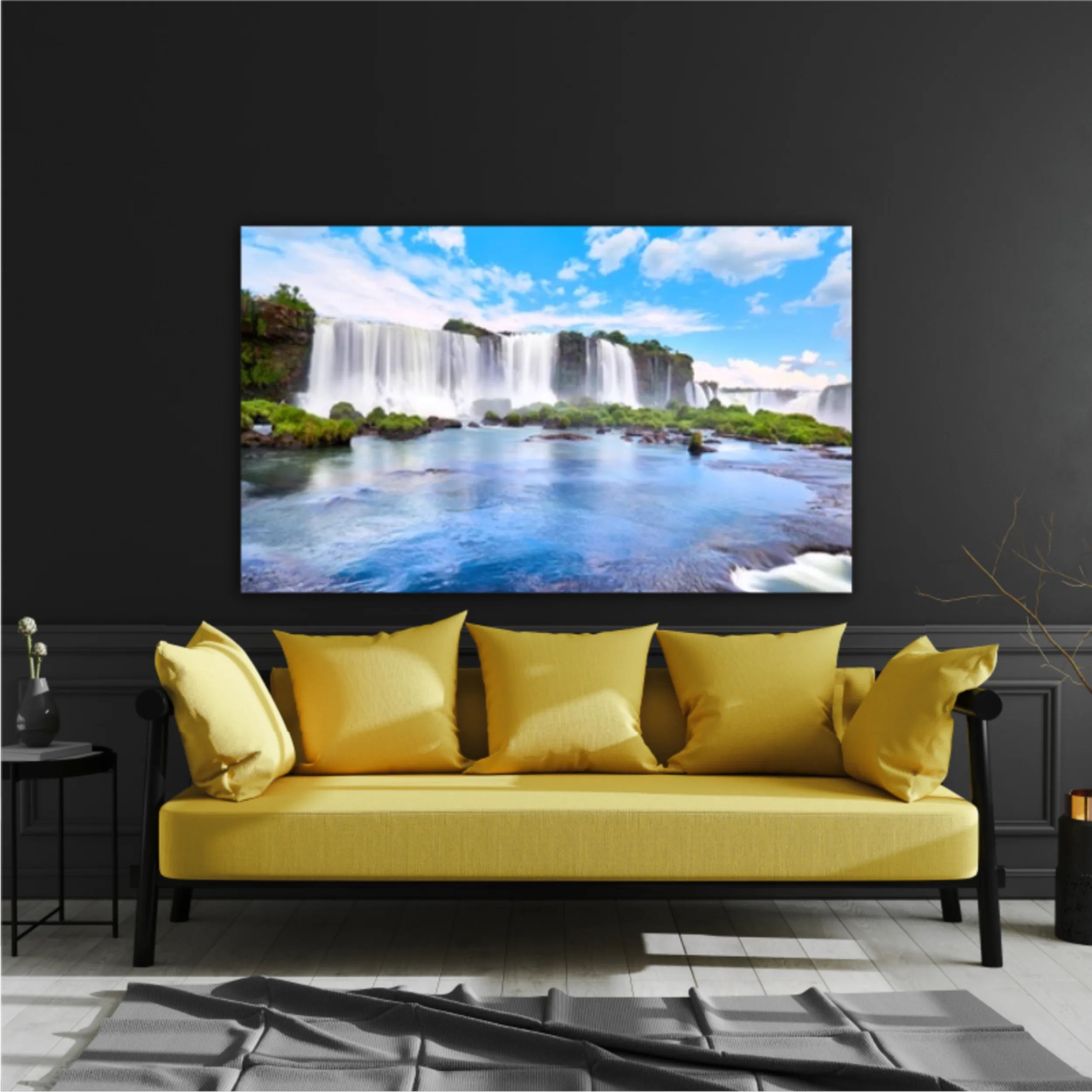 Panoramic view of many majestic powerful water cascades with mist and reflection of blue sky with clouds. Panoramic image of Iguazu valley