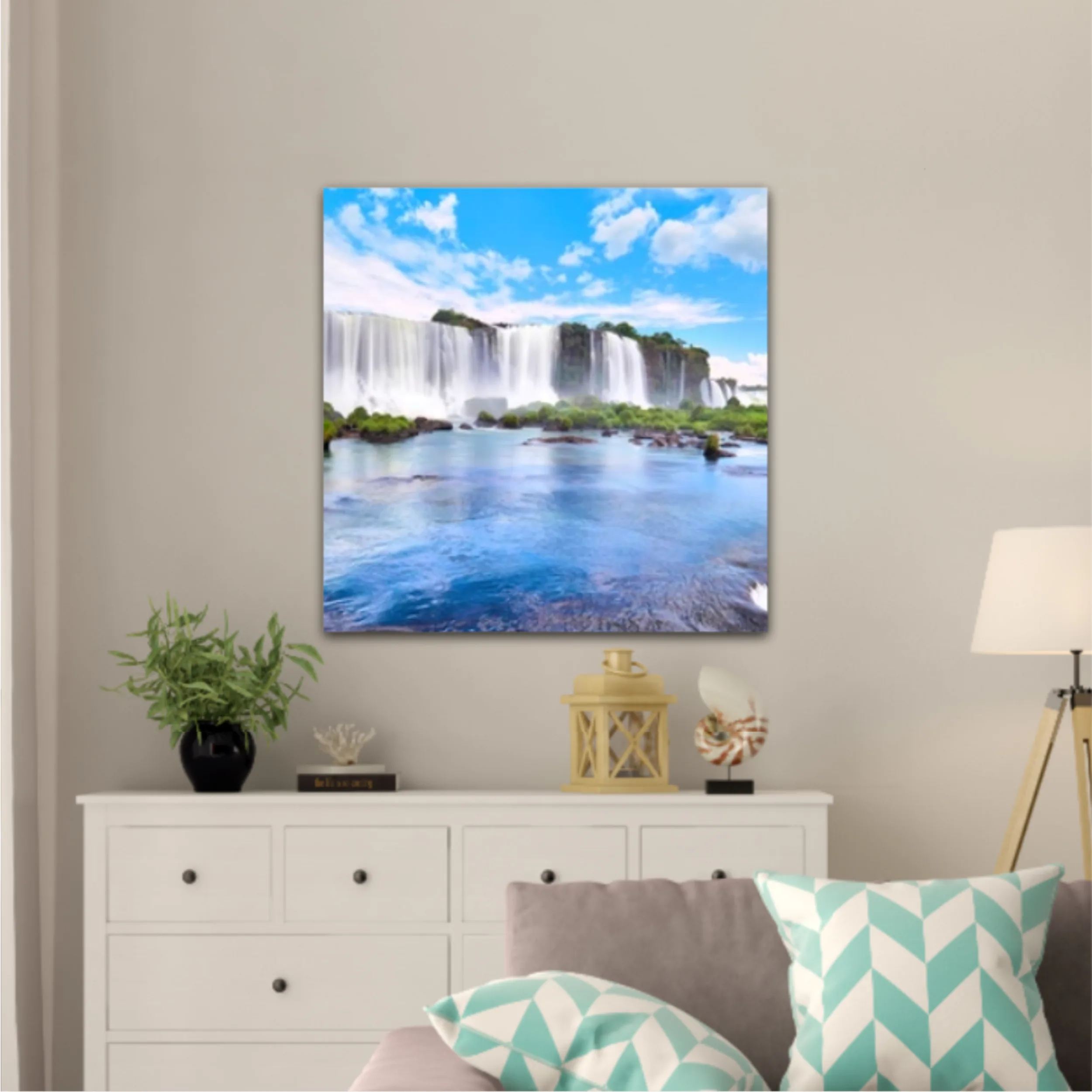 Panoramic view of many majestic powerful water cascades with mist and reflection of blue sky with clouds. Panoramic image of Iguazu valley