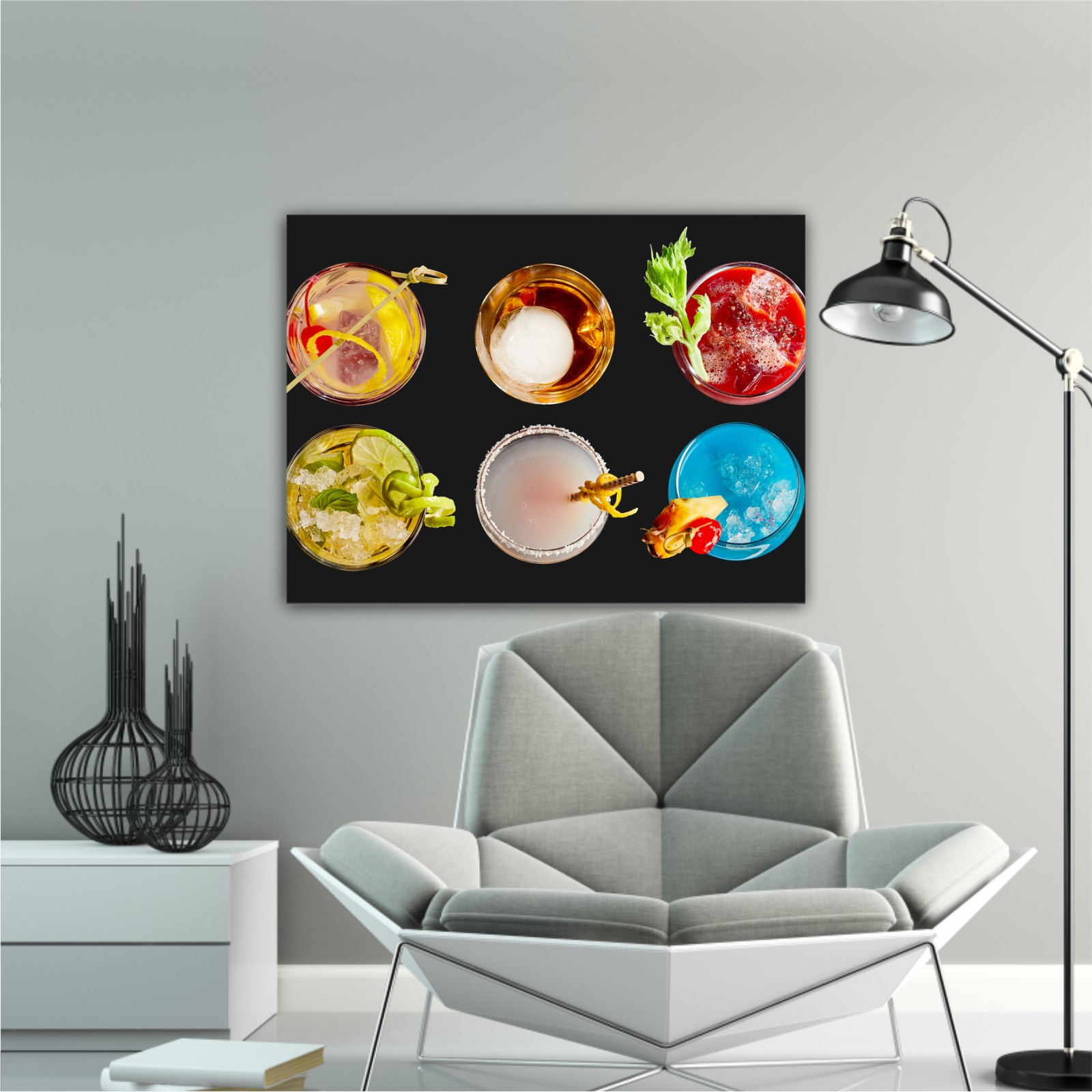 Panorama banner with an assortment of colorful exotic alcoholic cocktails served in glasses with garnishes viewed in two neat lines top down on black