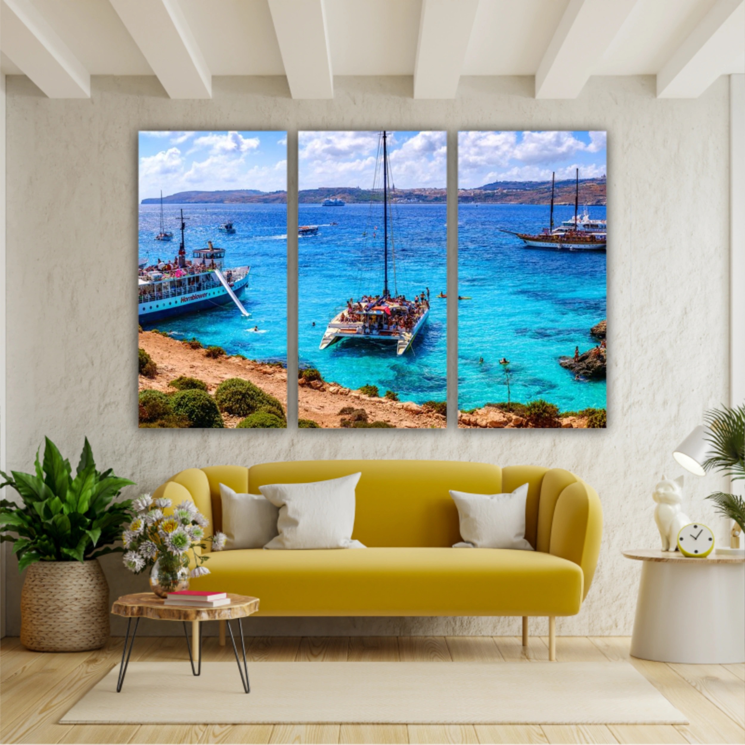 Comino, Malta. Tourists crowd at Blue Lagoon to enjoy the clear turquoise water on a sunny summer day with and boats on Comino island, Malta.