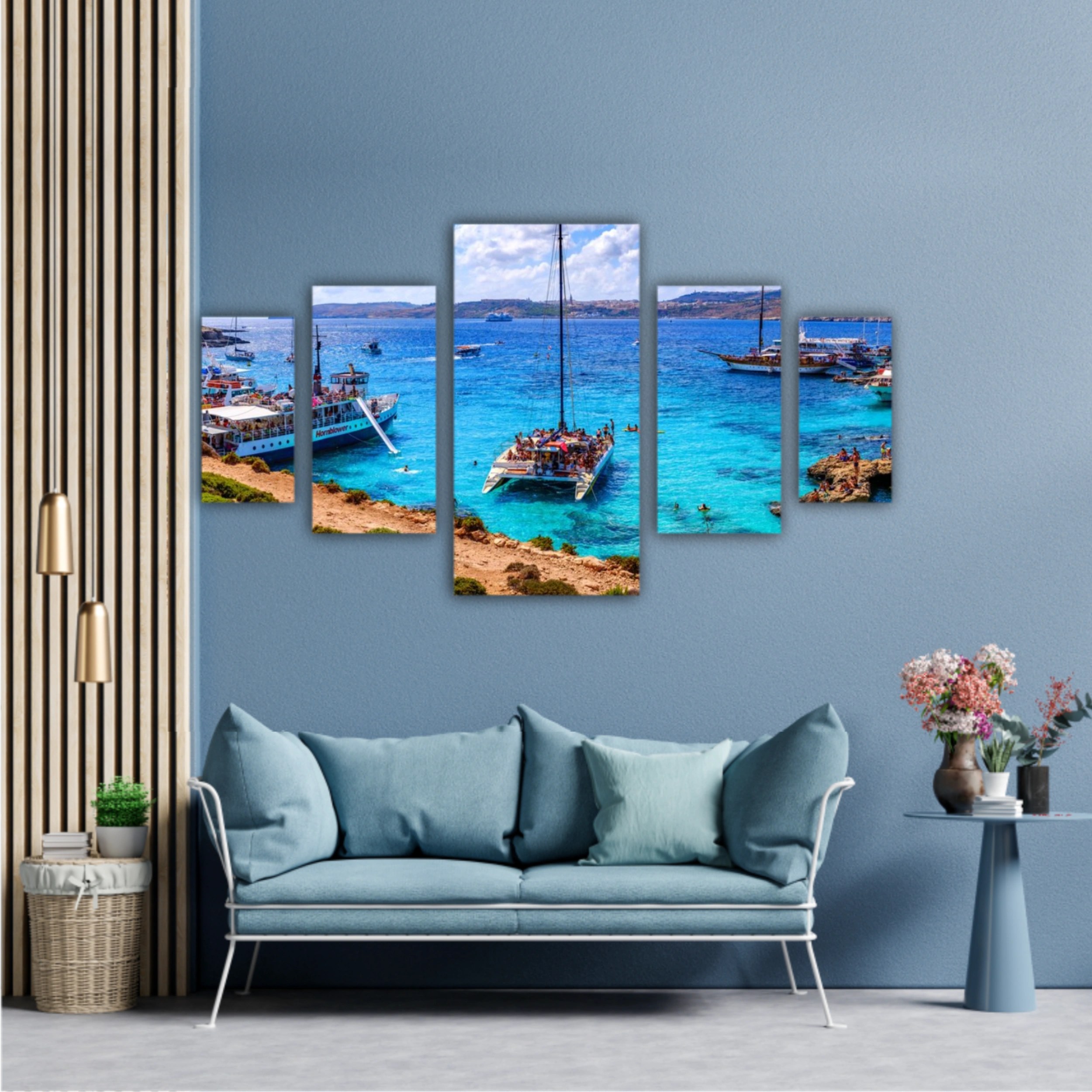 Comino, Malta. Tourists crowd at Blue Lagoon to enjoy the clear turquoise water on a sunny summer day with and boats on Comino island, Malta.