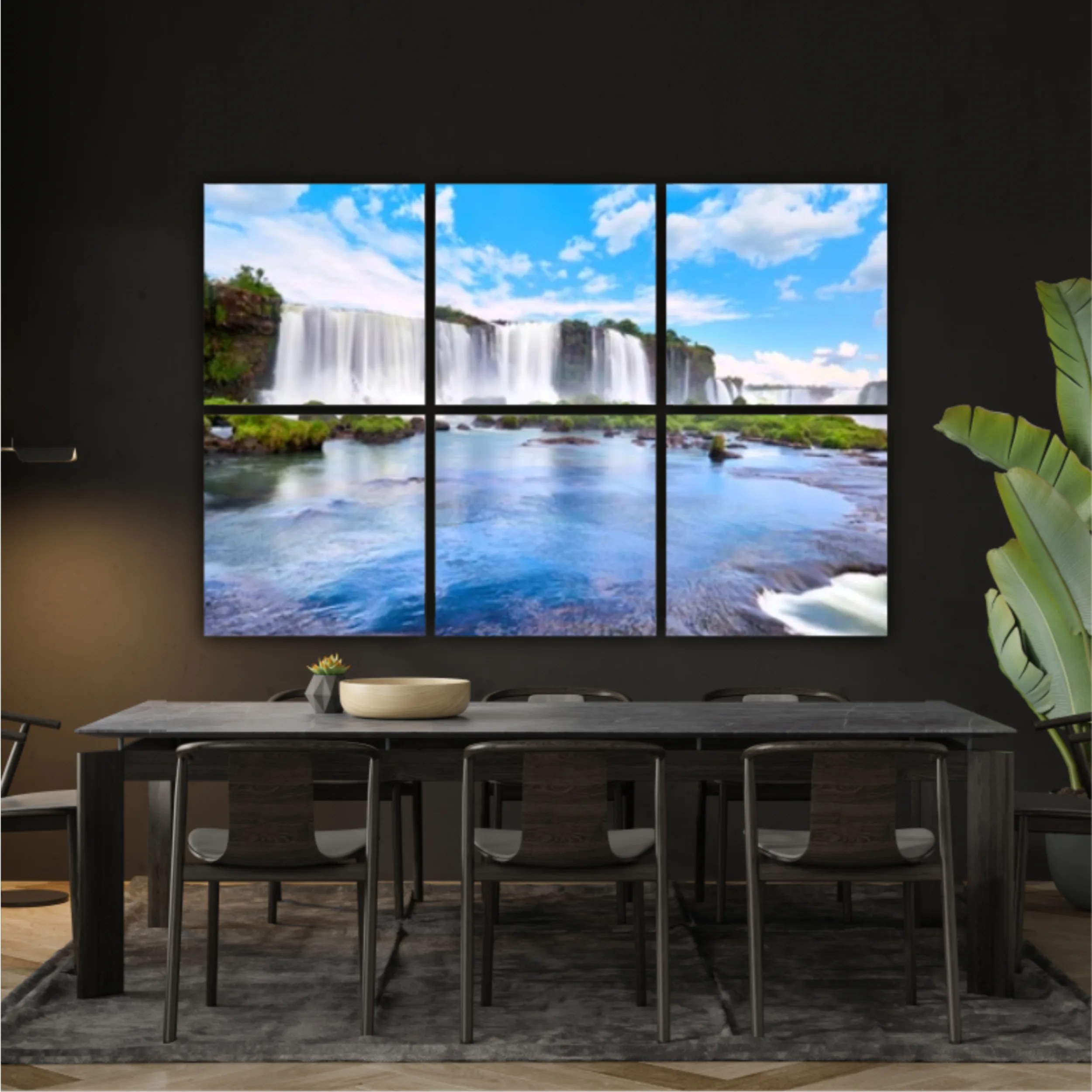 Panoramic view of many majestic powerful water cascades with mist and reflection of blue sky with clouds. Panoramic image of Iguazu valley