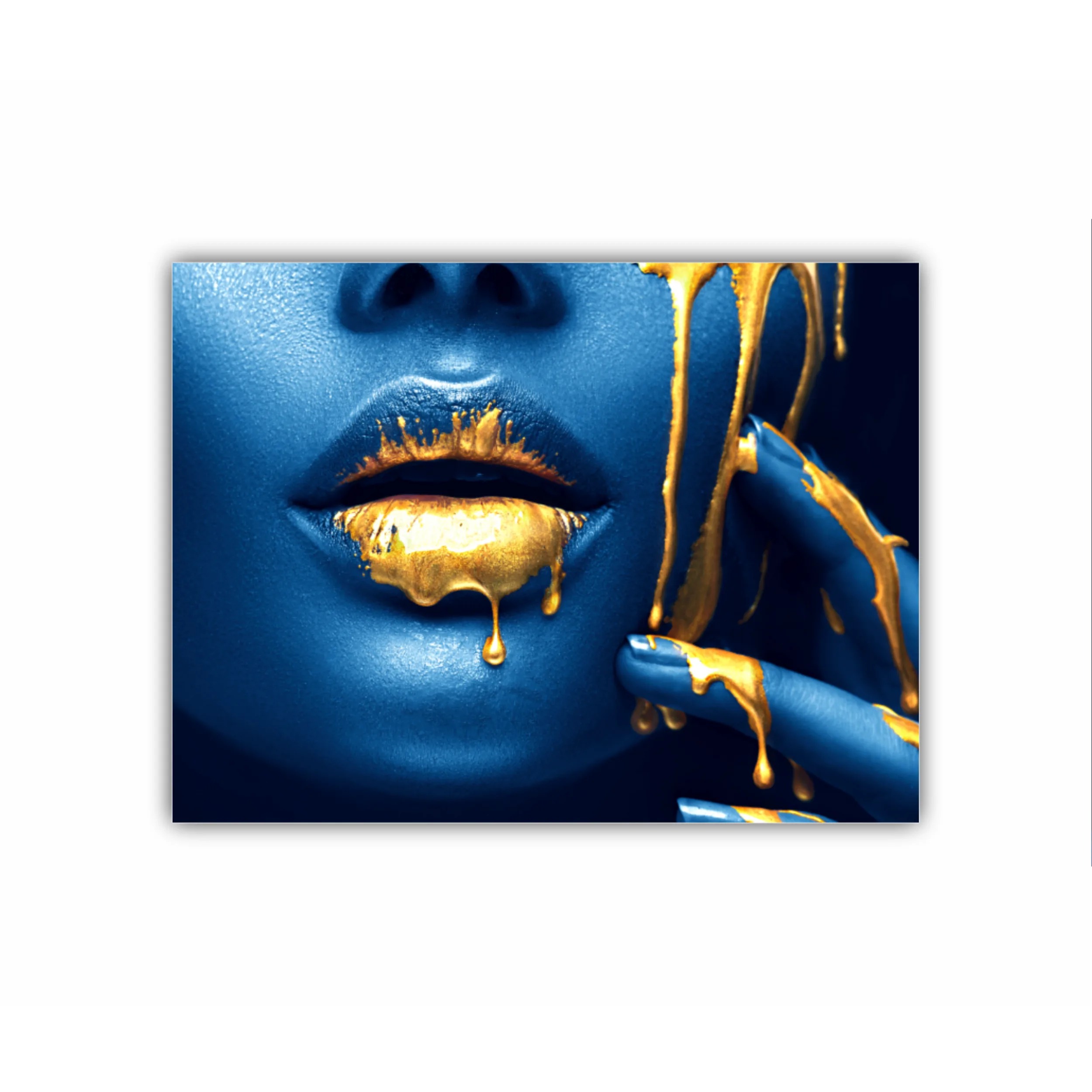 Lipgloss dripping from sexy lips, golden liquid drops on beautiful model girls mouth, gold metallic skin make-up. Beauty woman makeup close up